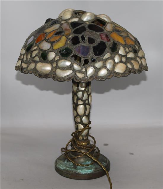 An Arts & Crafts shell and stained glass lamp, ( a.f.)